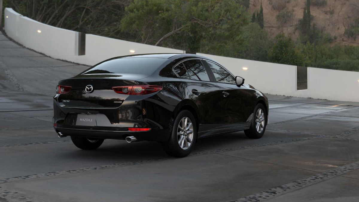 Rear angle view of a black 2021 Mazda6 with good trunk space