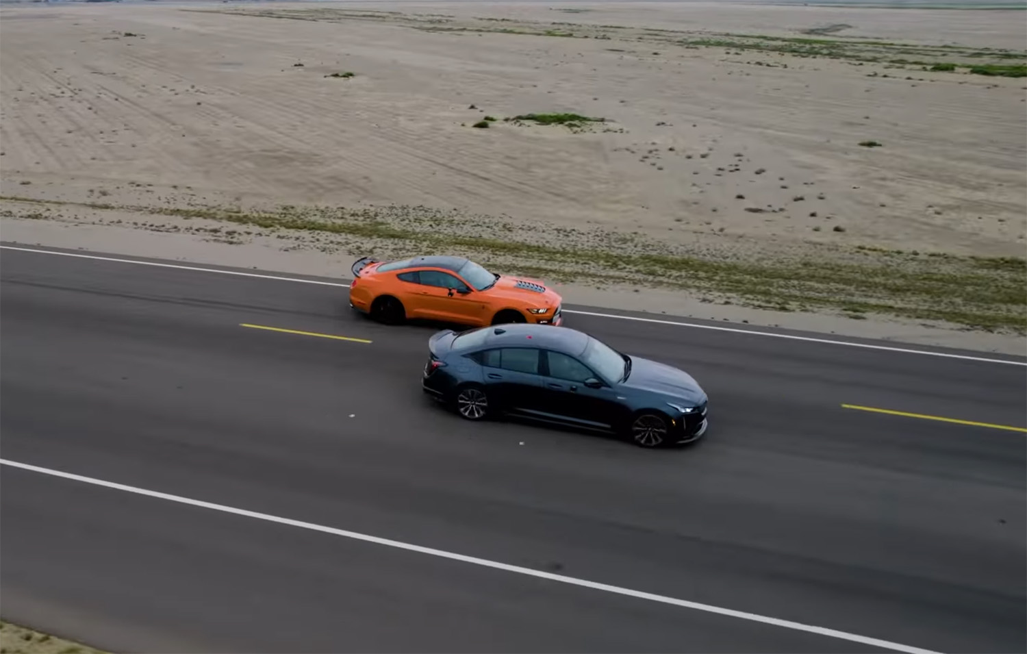 Flyover drone shot of 2022 CT5-V and 2020 Shelby GT500 during Edmunds U-drag shoot
