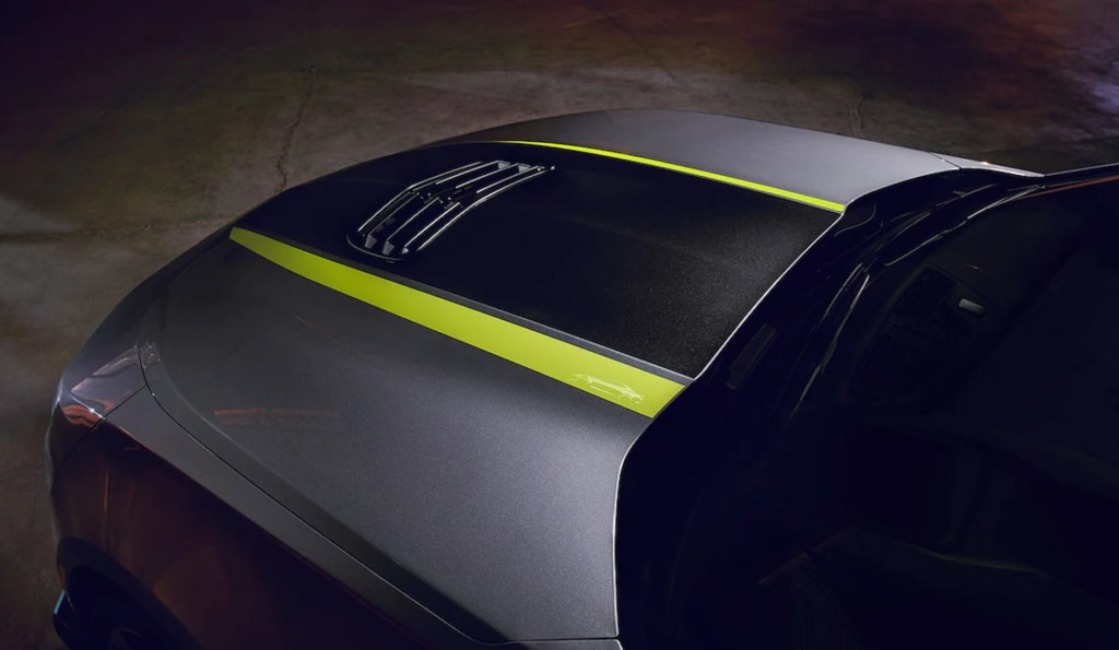 A gray-with-black-and-yellow-stripes 2022 Chevrolet Camaro Steel and Shock Special Edition hood