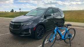 2022 Chevy Equinox with an electric bike next to it