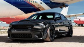 2022 Dodge Charger Jailbreak parked at a landing bay at an airport