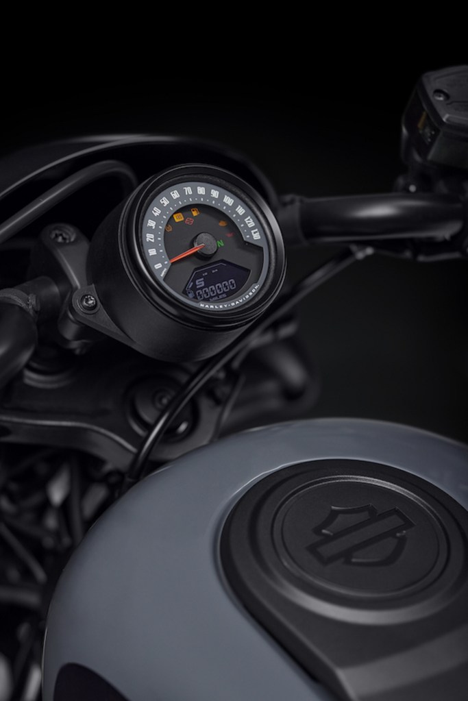 A gray 2022 Harley-Davidson Nightster's analog speedometer with a multi-function LCD