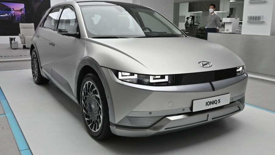 A silver 2022 Hyundai Ioniq 5 parked indoors.