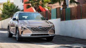 The 2022 Hyundai Nexo hydrogen fuel cell compact SUV model in with a bronze paint color option