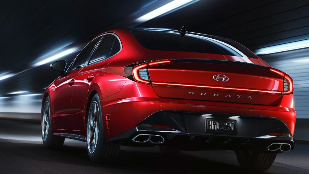 The rear end of a 2022 Hyundai Sonata N-Line as it drives through a tunnel at night.