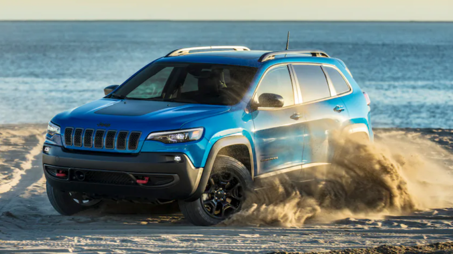 The 2022 Jeep Cherokee kicking up sand