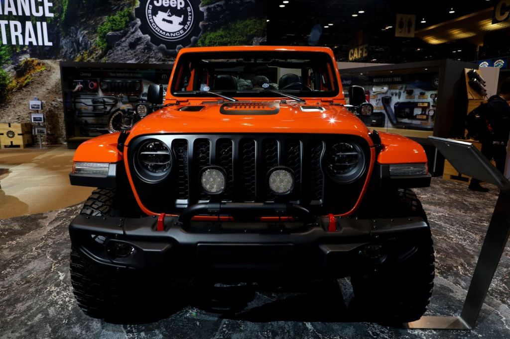 A orange 2022 Jeep Gladiator in an indoor environment.