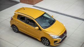 An overhead shot of the 2022 Mitsubishi Mirage subcompact hatchback with a gold paint color option