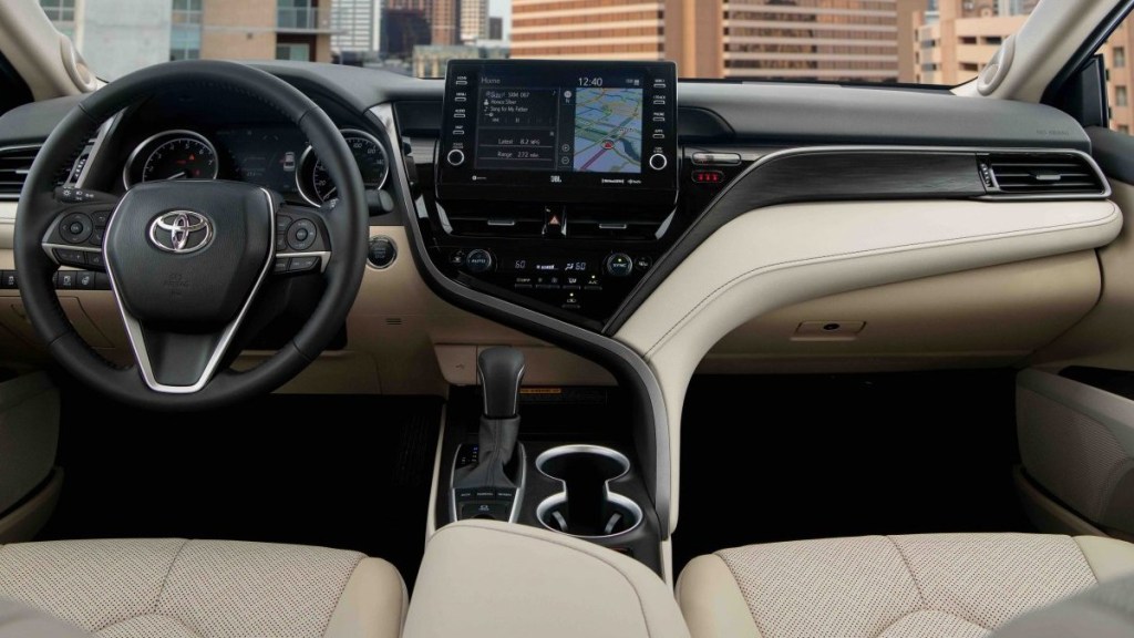 the interior of a new 2022 Toyota Camry showing off the two large displays available to drivers