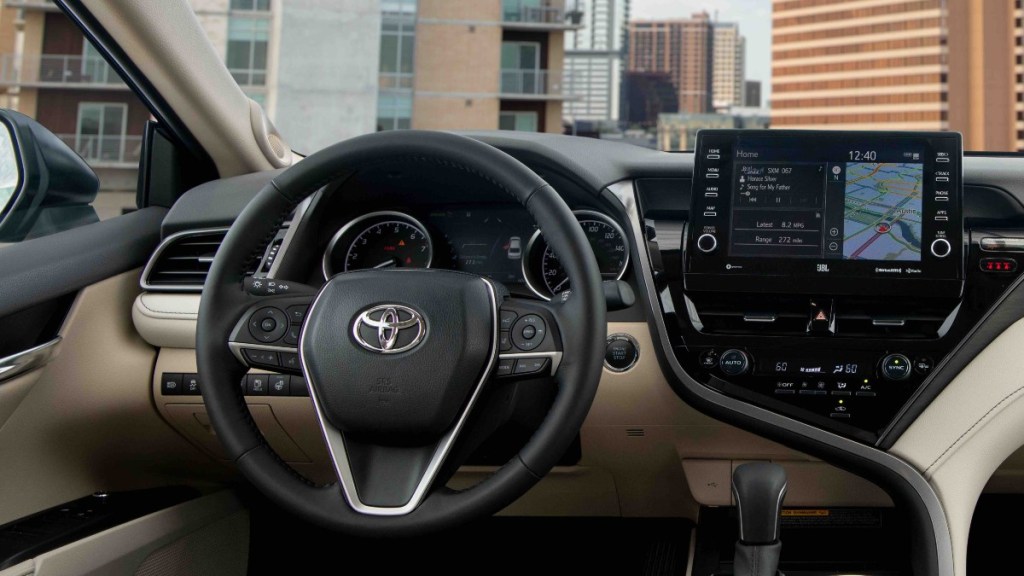 The interior 2022 Toyota Camry XLE showing off the seven-inch display in the gauge cluster and the infotainment system with the JBL audio system