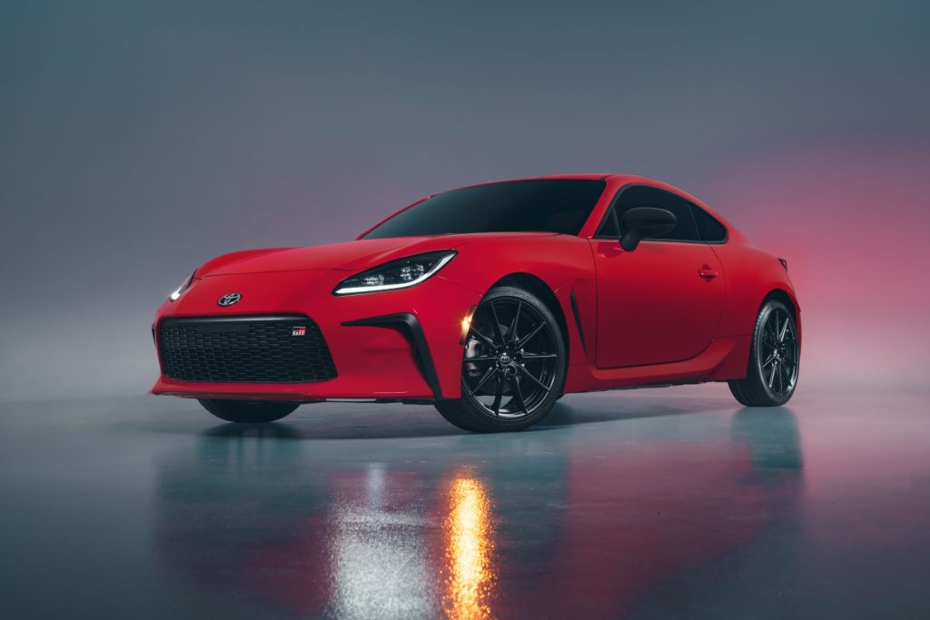 A promotional shot of the 2022 Toyota GR86 sports car in red