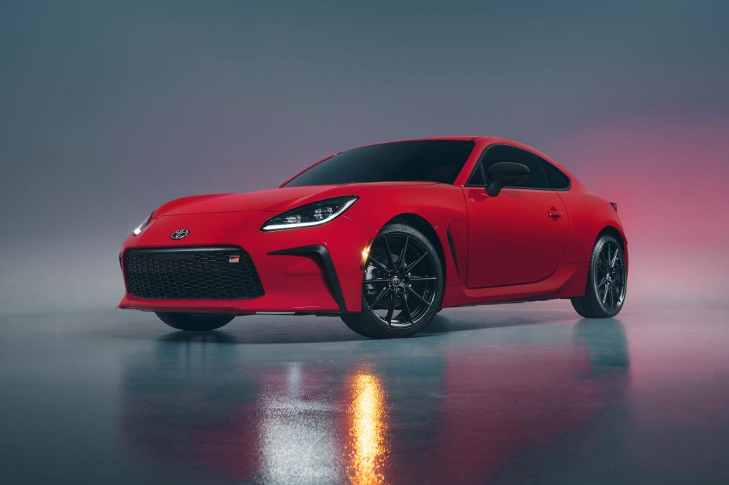 A promotional shot of the 2022 Toyota GR86 sports car in red