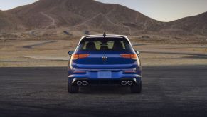 Rear view of a blue 2022 VW Golf R hatchback