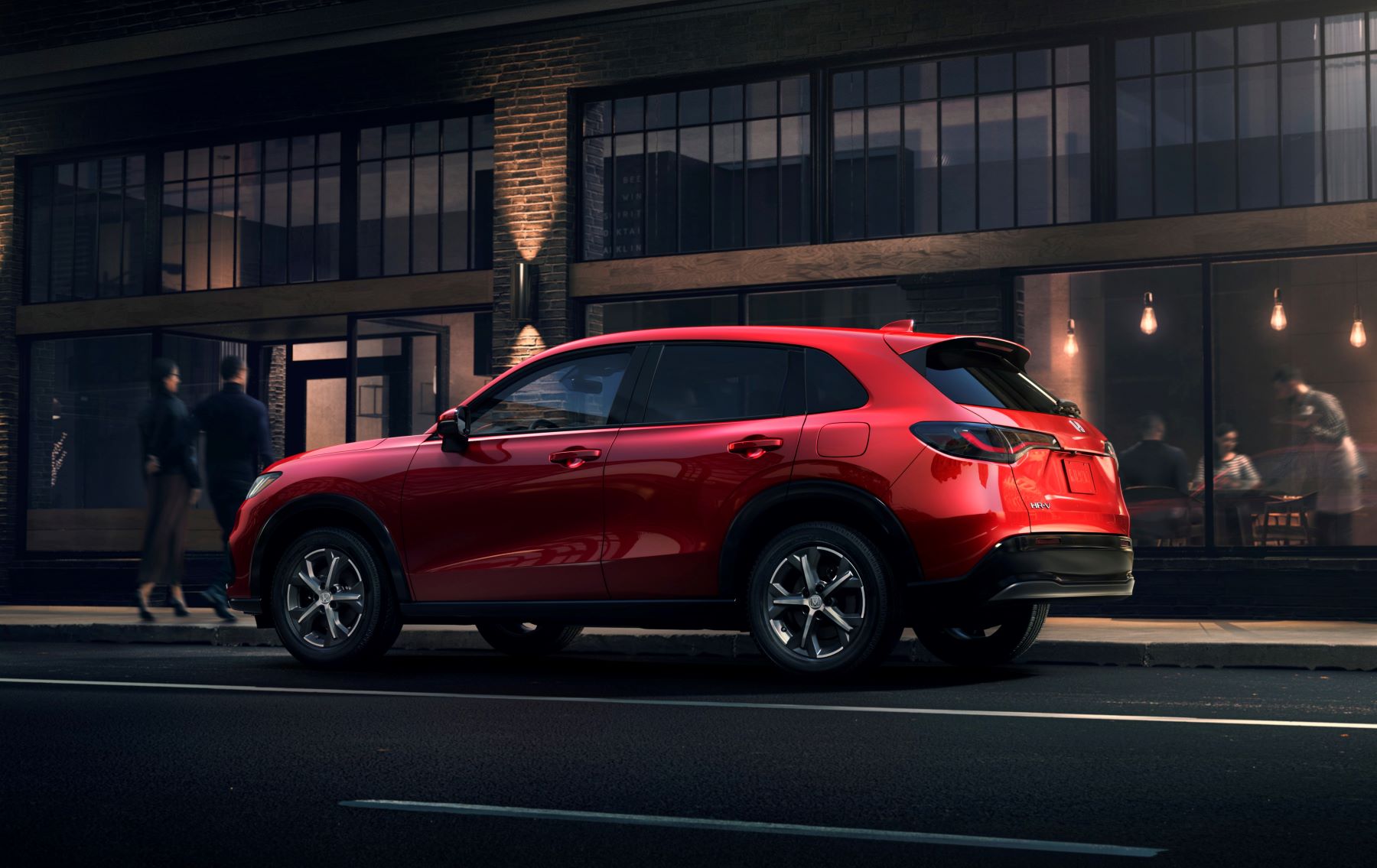 The 2023 Honda HR-V subcompact SUV in red with new athletic styling
