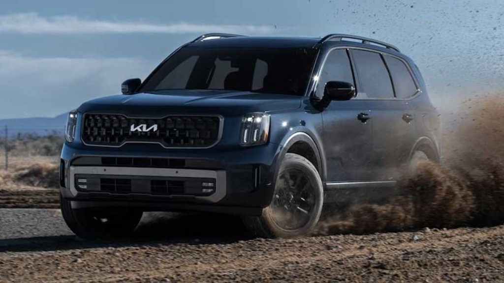 Blue 2023 Kia Telluride playing in the dirt. Is this truly an off-road SUV?