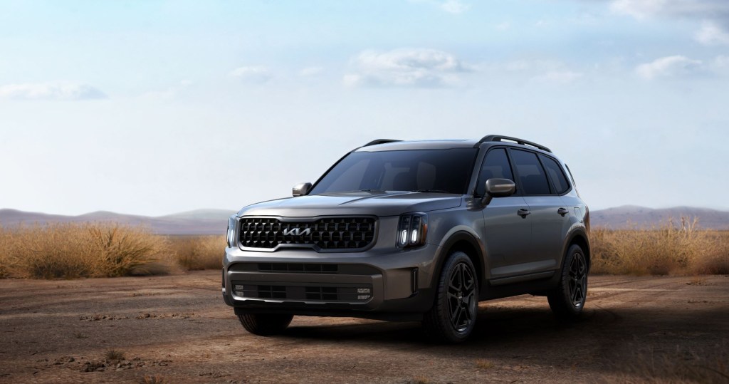 2023 Kia Telluride midsize SUV in silver gray parked on a deserted dirt road