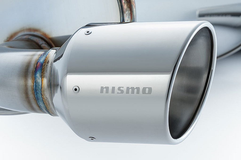 A closeup view of the 2023 Nissan Z Nismo stainless-steel muffler exit