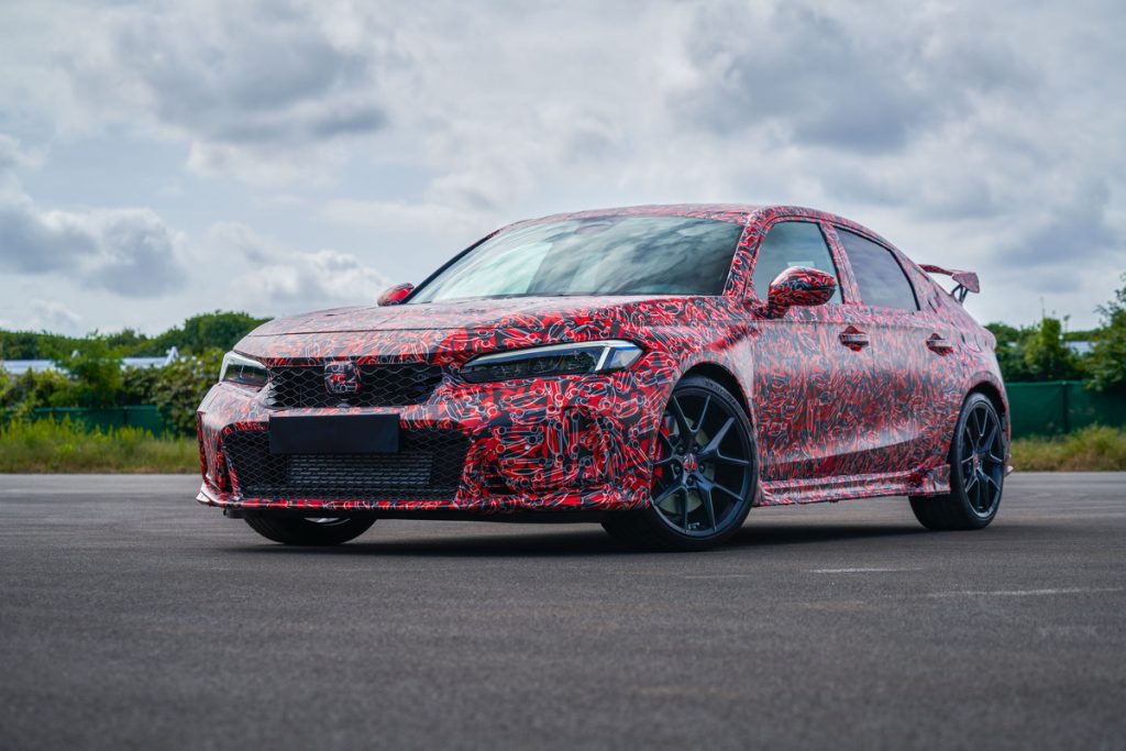 2023 Honda Civic Type R hatchback wrapped fully in red-and-white camouflaged wrapping