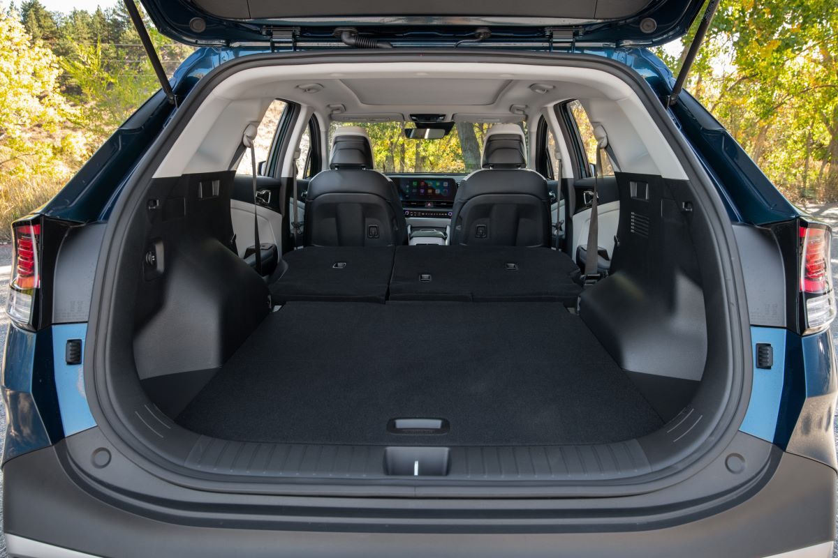 Interior look at the 2023 Kia Sportage Hybrid's cargo space with the rear seats folded flat