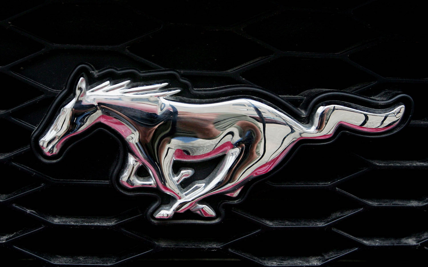 The grille emblem of a 2024 Ford Mustang.
