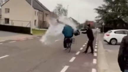Car Salesperson Dumps Bucket of Water on Cyclist That Spits on His Cars Every Day