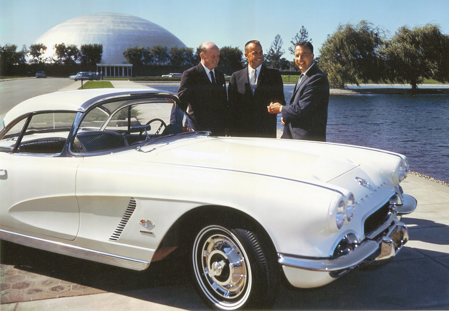 Alan B. Shepard (center) with GM Styling President William L. Mitchell (left) and Chevrolet General Manager Edward N. Cole (right) with Shepard's 1962 Corvette.