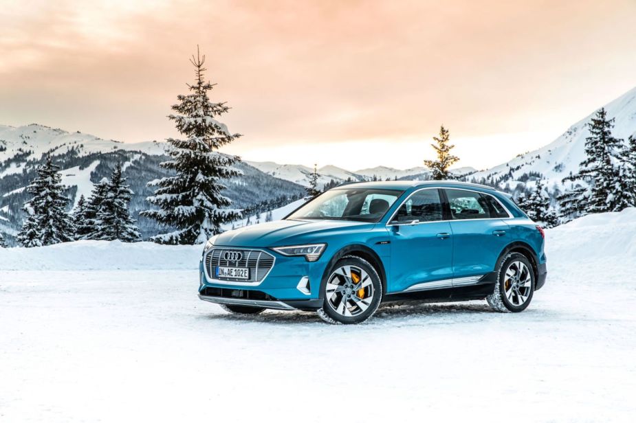 The Audi e-tron all-electric SUV model parked on a snowy mountain