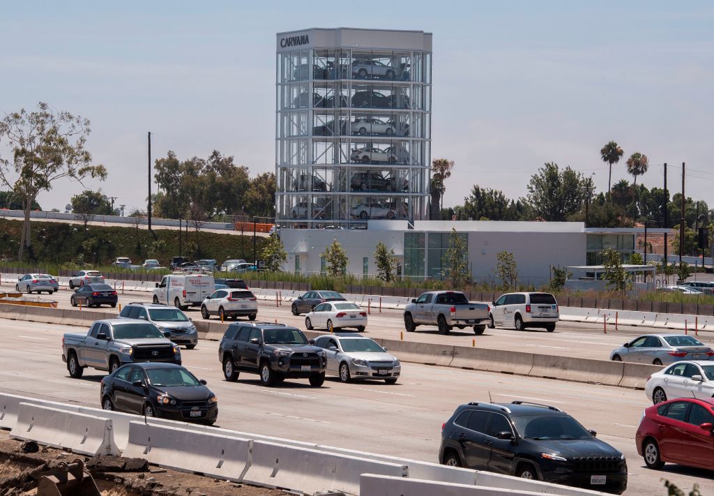 An eight story car vending machine, operated by the online used car dealer Carvana, that dispenses purchased cars to customers is seen in Huntington Beach, California