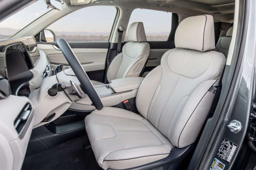 Dashboard and front seats in 2023 Hyundai Palisade, highlighting its release date and price