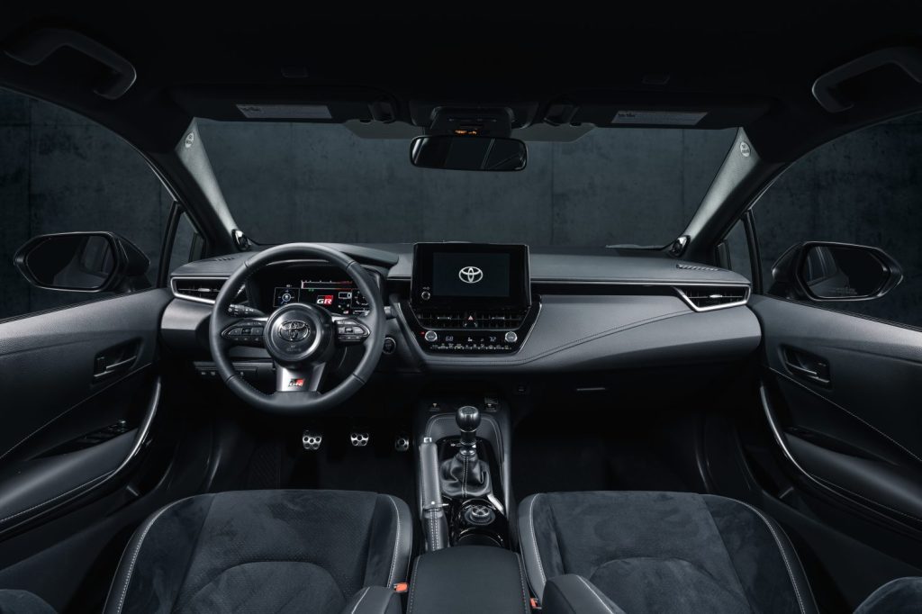 Dashboard and front seats in 2023 Toyota GR Corolla, highlighting its release date and price
