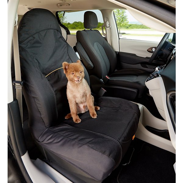 A dog sits on a bucket seat car seat cover for the front passenger. best dog car seat covers