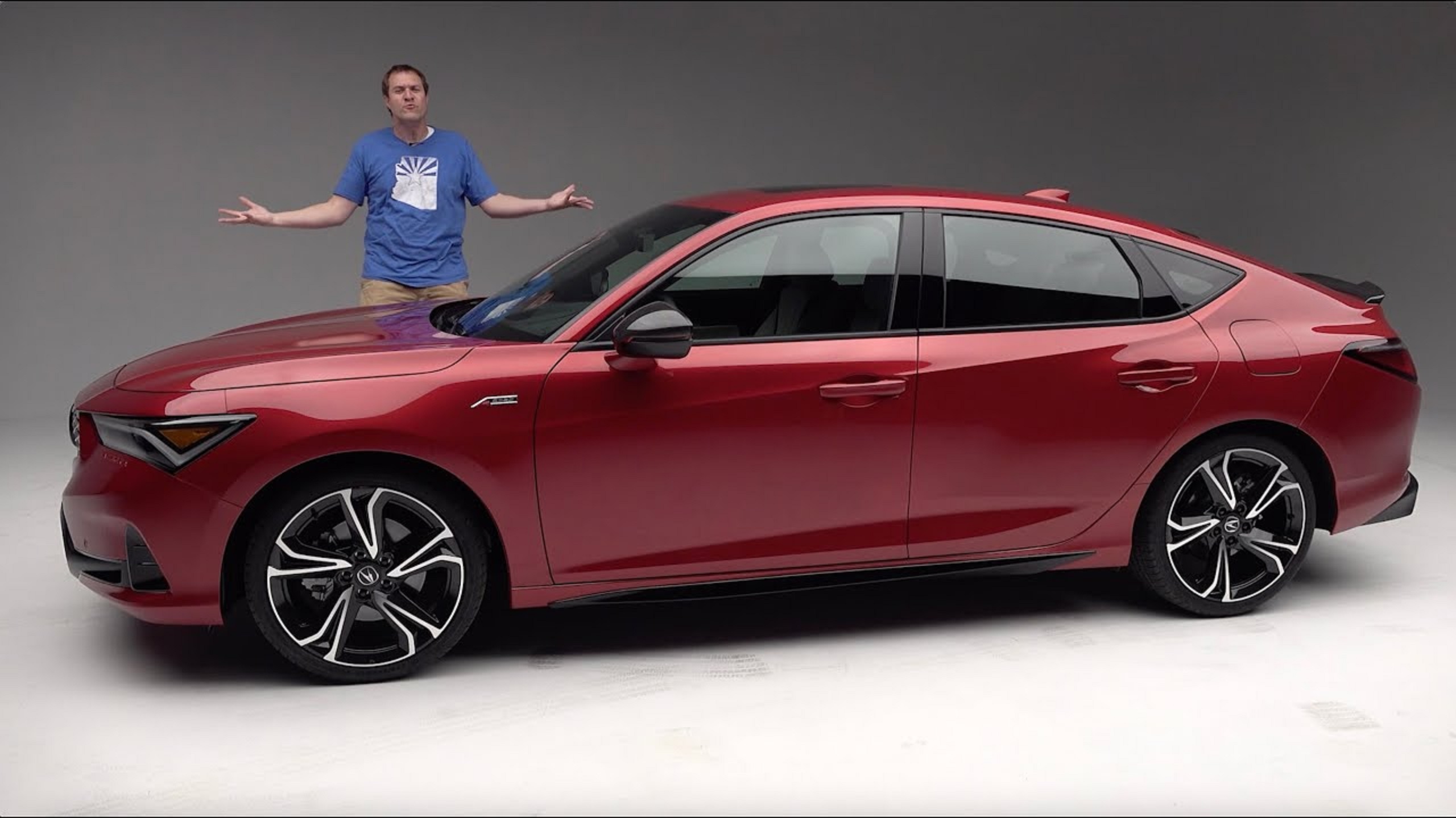Doug DeMuro with a maroon 2023 Acura Integra A-Spec with Technology Package
