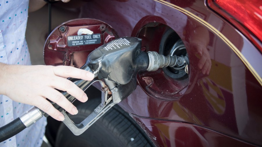Filling up a gas tank. Are you driving in a way that increases your fuel economy?