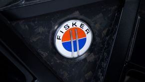 An illuminated Fisker logo seen at the SK telecom booth at the GSMA Mobile World Congress in Barcelona, Spain