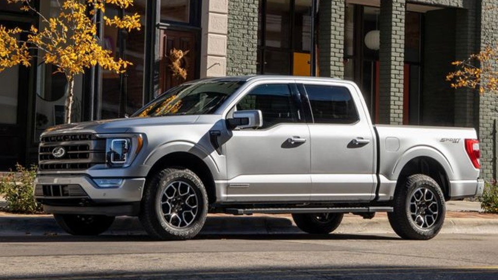 Silver Ford F-150 parked on the street. The F-150 has been the top-selling truck in America for many yeas.