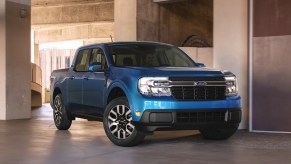 A blue 2022 Ford Maverick small pickup truck is parked.