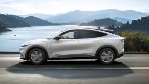 The side of a white 2022 Ford Mustang Mach-E electric SUV.