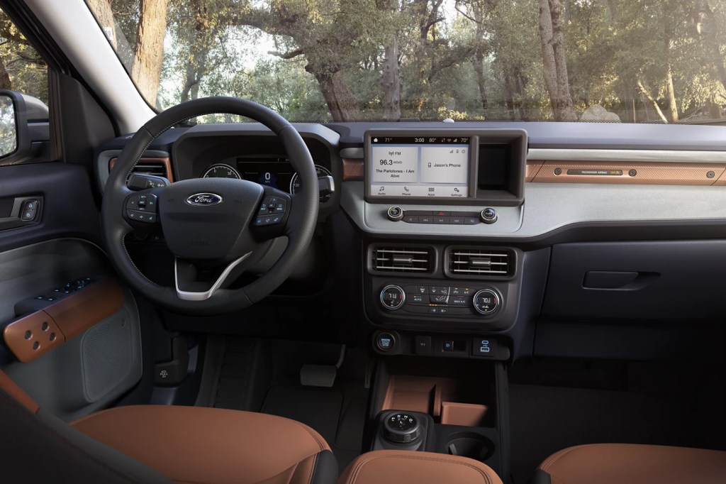 The interior space of the 2022 Ford Maverick pickup truck, showing a rather small infotainment screen.