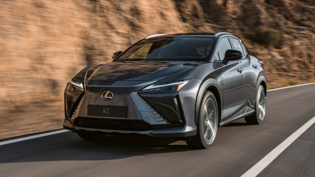 Front angle view of gray 2023 Lexus RZ, highlighting its release date and price