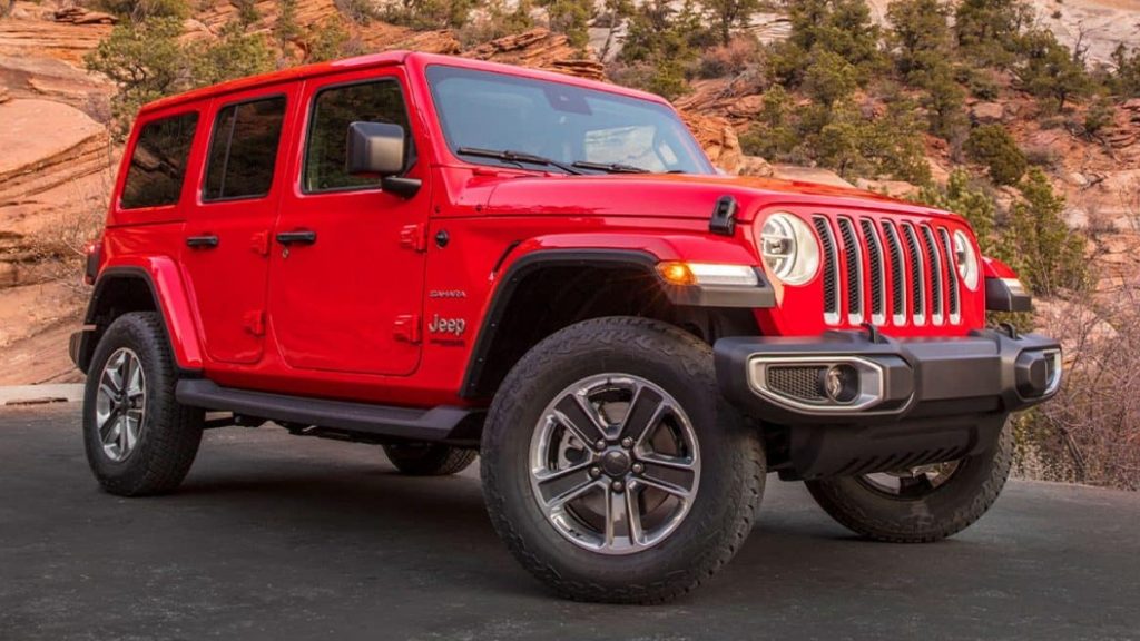 Front angle view of red 2022 Jeep Wrangler, which has the highest dealer markup in the U.S.