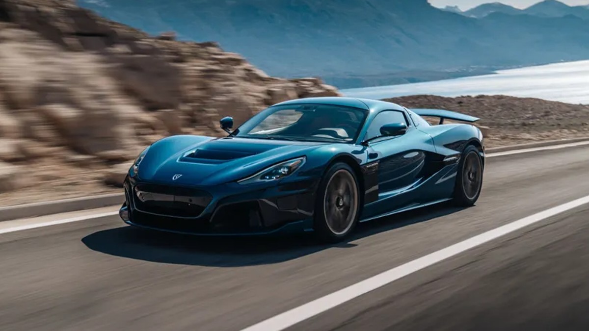 Front angle view of turquoise 2022 Rimac Nevera, the fastest car with the quickest 1/4-mile acceleration time
