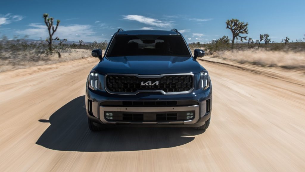 Front view of the blue 2023 Kia Telluride, highlighting the differences between the 2022 Telluride