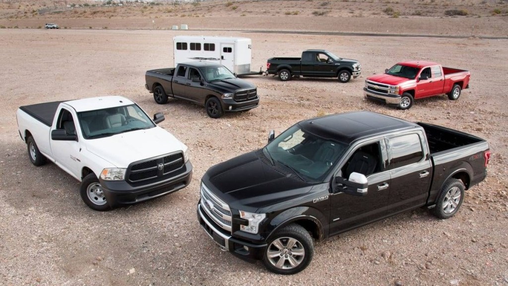 Several Half-Ton pickup trucks parked. Which one is the best truck for you to drive?