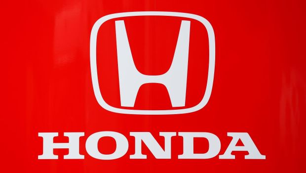 The Honda Japanese automaker logo with white text on a red background