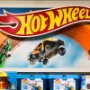 Hot Wheels sign and cars at a store, highlighting Colorado man that has a collection of over 30,000 Hot Wheels cars