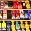 Hot Wheels toy cars displayed on a shelf, highlighting live-action Hot Wheels movie produced by J.J. Abrams' Bad Robot