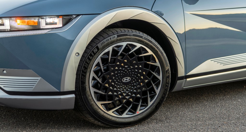 The wheel of a blue 2022 Hyundai Ioniq 5 electric SUV. 