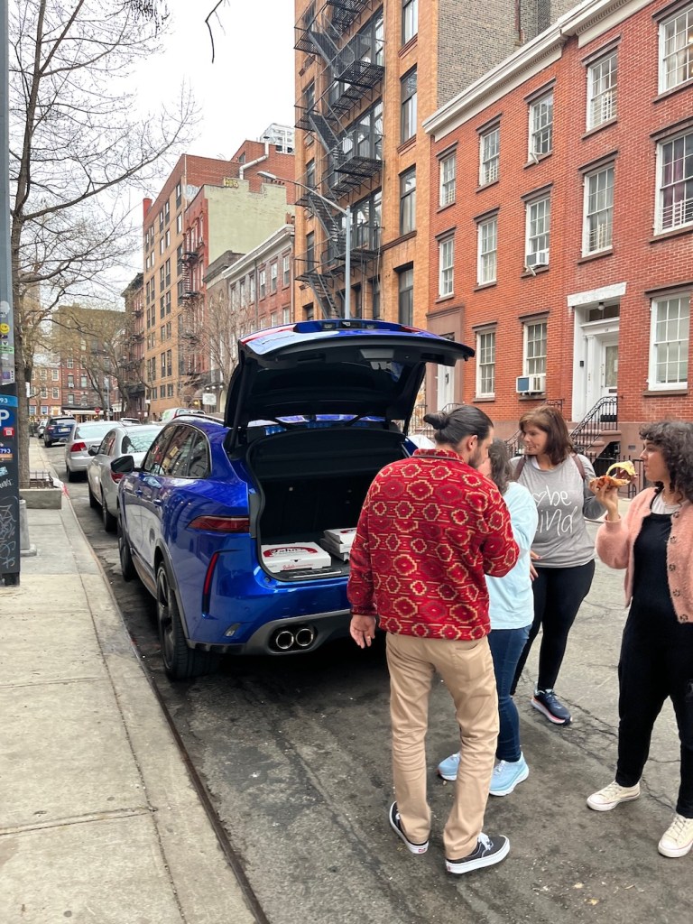 People standing around the 2021 Jaguar F-Pace SVR