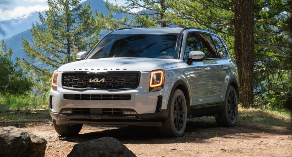 A white 2022 Kia Telluride is ranked well with COnsumer Reports as one of the best and cheapest 2022 three-row SUVs.