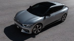 A silver Kia EV6 has unique styling as an electric SUV.